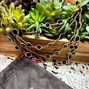 Gold multi strand necklace with black stones